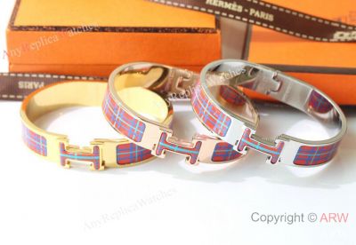 New AAA Replica Hermes Orange Plaid Enamel Bracelet for Sale